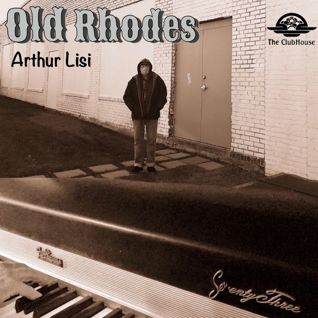Men dressed in jacket in front of old boarded up buildings gray
